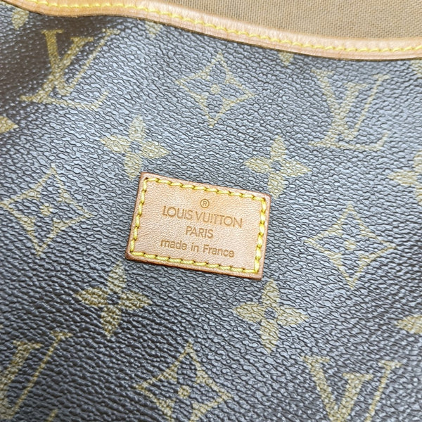 SAUMUR 30 Monogram Coated Canvas Brown