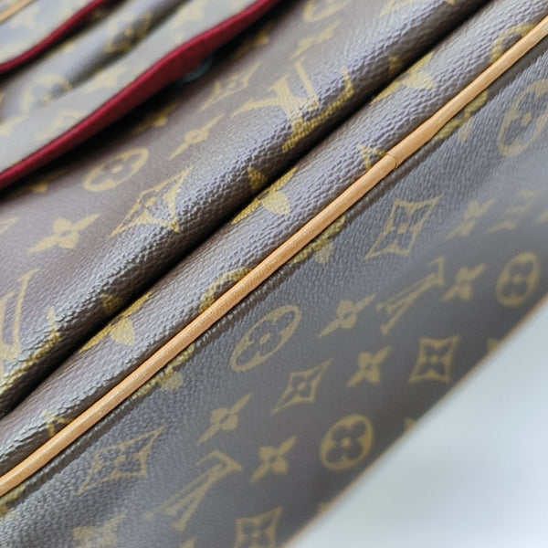 EXCENTRI-CITE Monogram Coated Canvas Brown