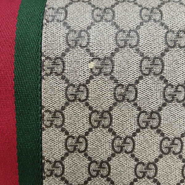 Ophidia mediana lona revestida con monograma beige