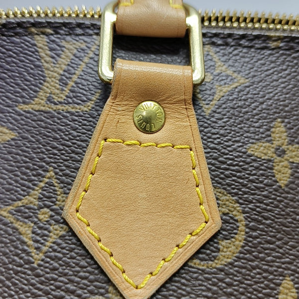 ALMA PM Monogram Coated Canvas Brown