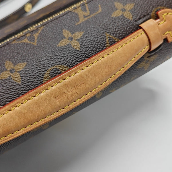 MÉTIS EAST WEST Monogram Coated Canvas Brown
