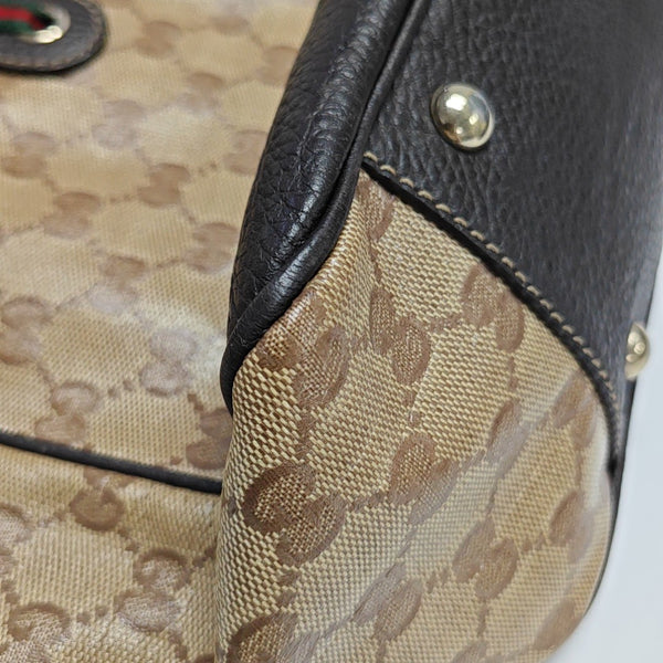 Princy Monogram Coated Canvas Brown