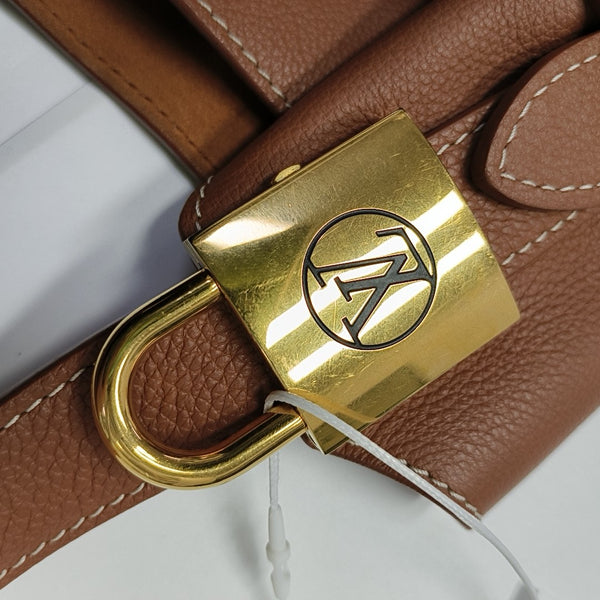LOW KEY HOBO PM Monogram Calfskin Brown