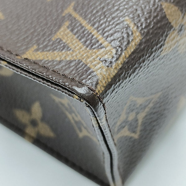TOILET POCKET 19 Monogram Coated Canvas Brown