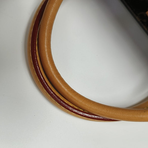 MONTAIGNE GM Monogram Coated Canvas Brown