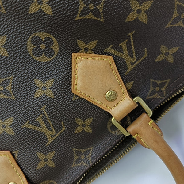 SPEEDY 25 Monogram Coated Canvas Brown
