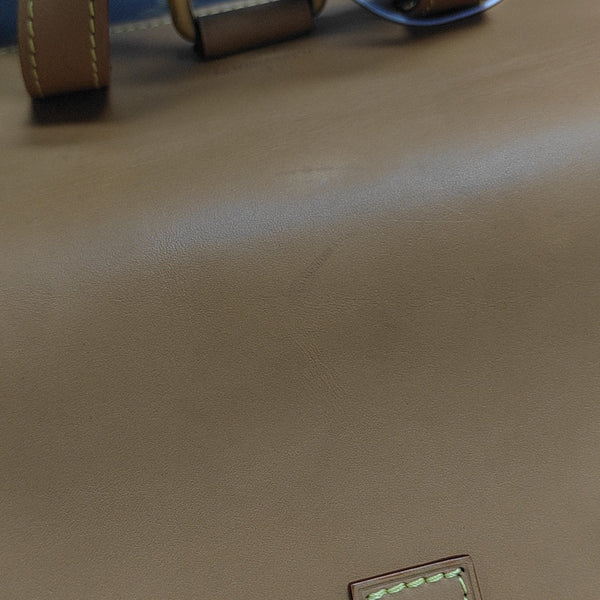 TRIO Monogram Coated Canvas Brown