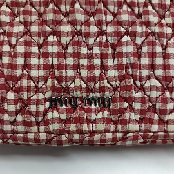 Bolso bandolera de tela acolchada rojo