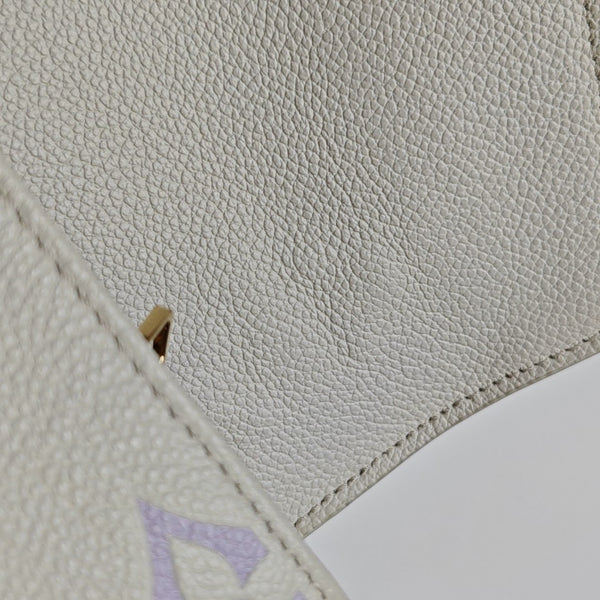 MÉTIS EAST WEST Monogram Calfskin White