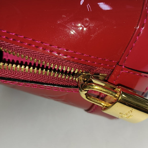 Authenticated pre-owned ALMA BB Monogram Patent Leather Red - Shoulder Bag at Looply