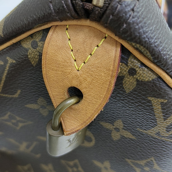 SPEEDY 30 Monogram Coated Canvas Brown