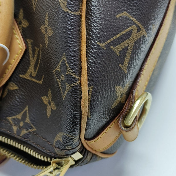 SPEEDY 25 Monogram Coated Canvas Brown