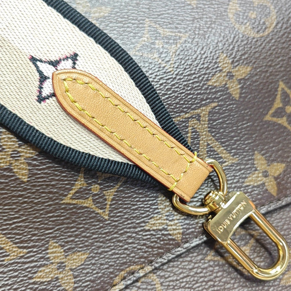 DIANE Monogram Coated Canvas Brown