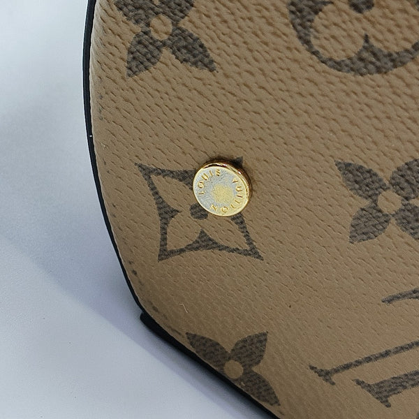 CANNES PM Monogram Coated Canvas Brown