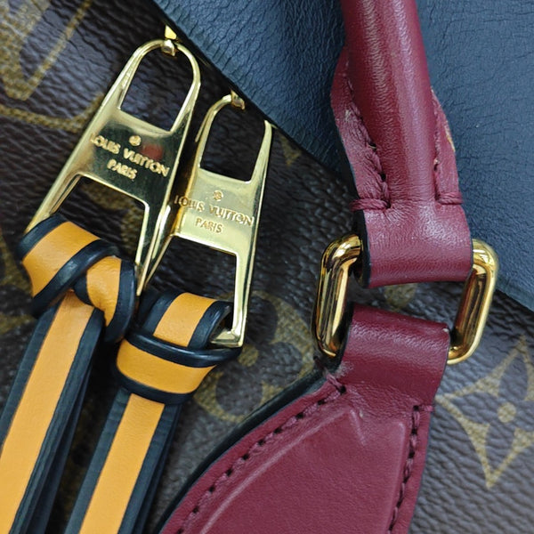 TUILERIES Monogram Coated Canvas Brown