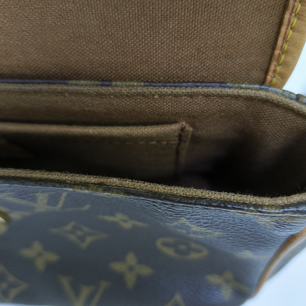 TIKAL Monogram Coated Canvas Brown
