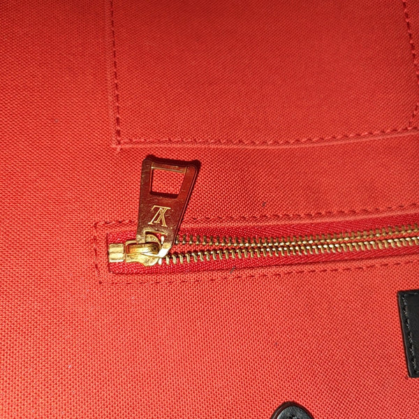 ONTHEGO MM Monogram Coated Canvas Brown