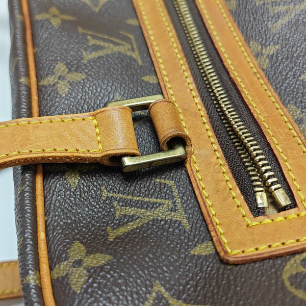 CITE GM Monogram Coated Canvas Brown