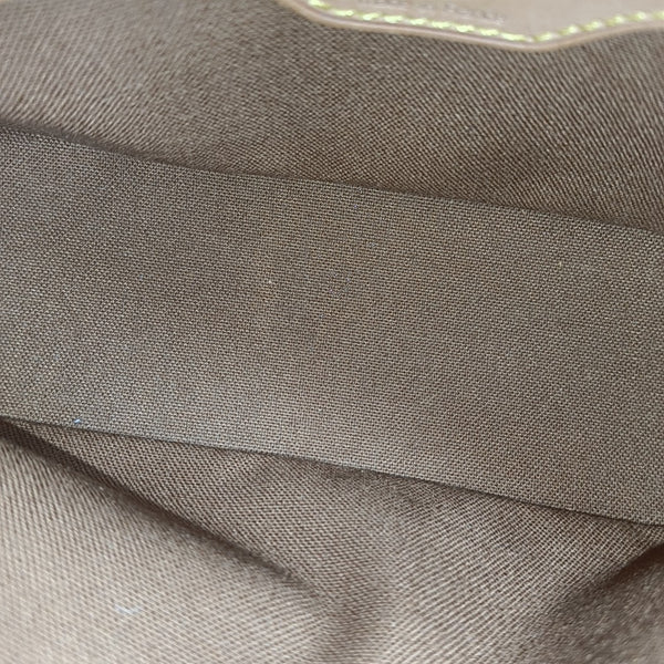TROTTER Monogram Coated Canvas Brown