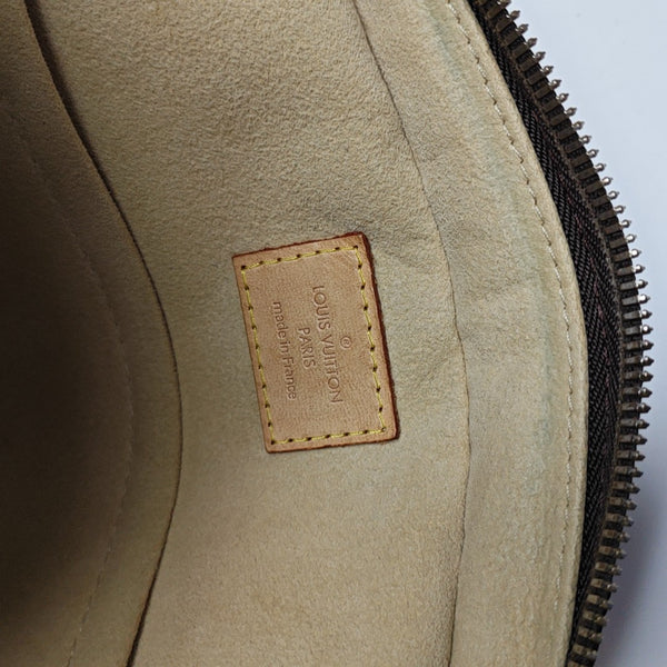 MANHATTAN PM Monogram Coated Canvas Brown