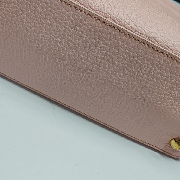 Authenticated pre-owned CAPUCINES PM Calfskin Pink - Shoulder Bag at Looply
