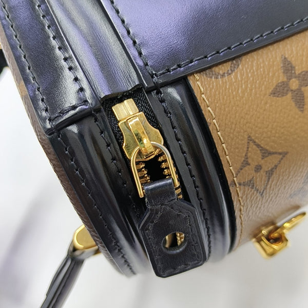 CANNES PM Monogram Coated Canvas Brown