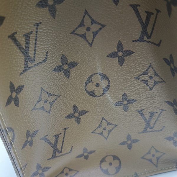 ONTHEGO MM Monogram Coated Canvas Brown