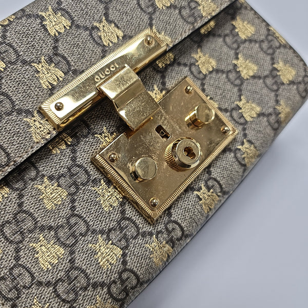 Padlock Small Monogram Coated Canvas Beige