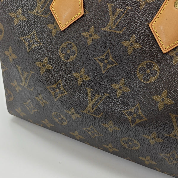 SPEEDY 25 Monogram Coated Canvas Brown