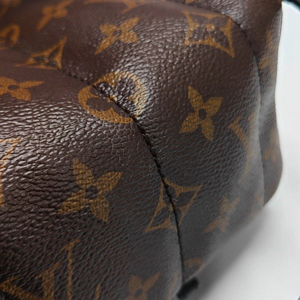 Authenticated pre-owned PALM SPRINGS Mini Monogram Coated Canvas Brown - Backpack at Looply