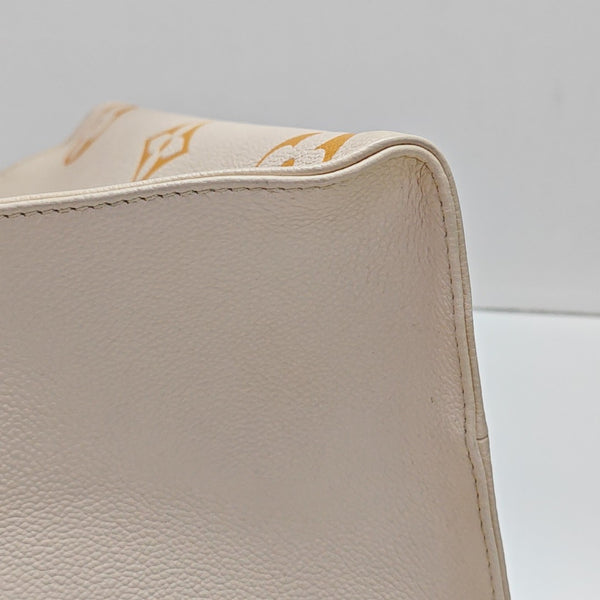 ONTHEGO MM Monogram Calfskin Beige