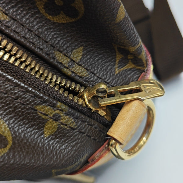 ICARE Monogram Coated Canvas Brown