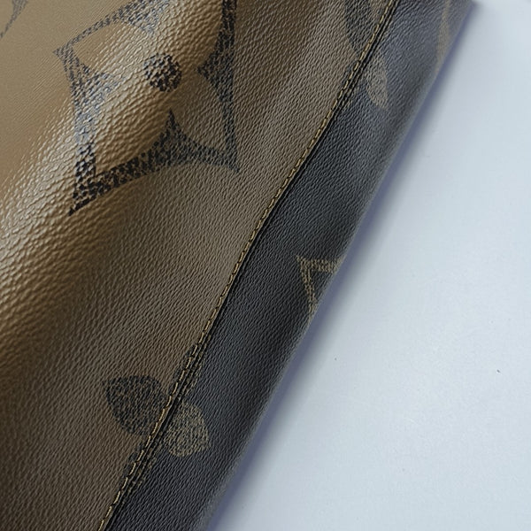 ONTHEGO MM Monogram Coated Canvas Brown