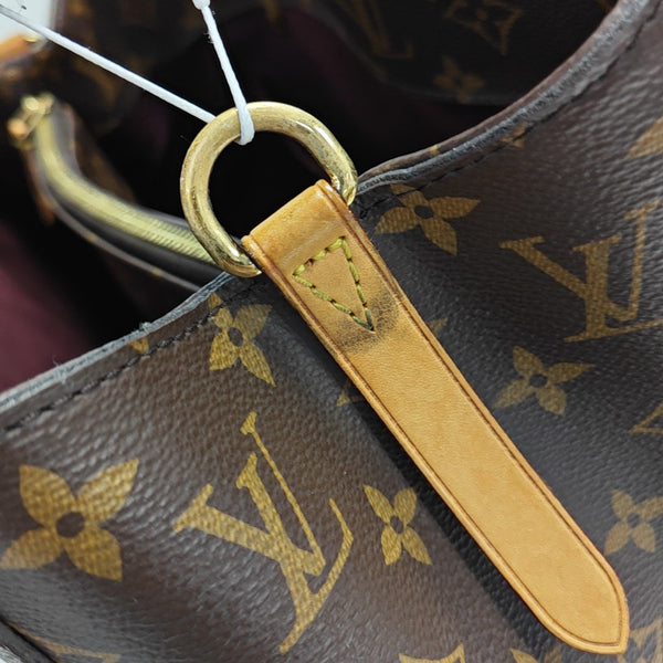 MONTAIGNE GM Monogram Coated Canvas Brown