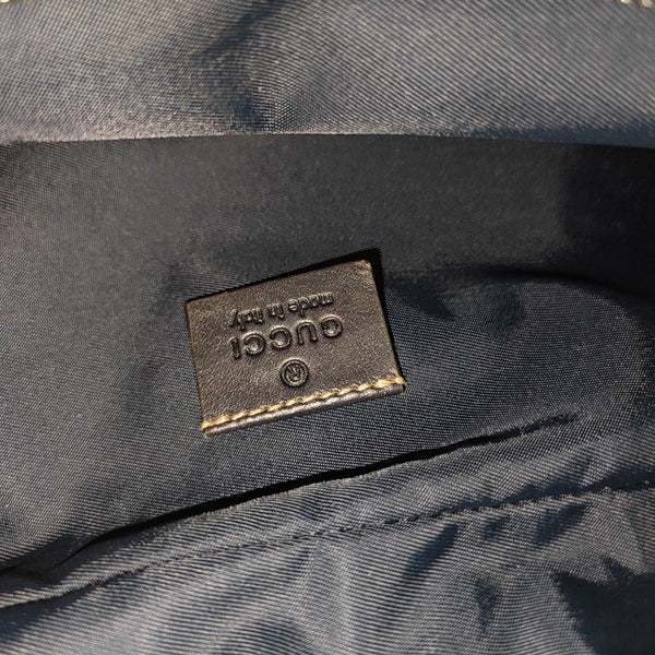 Monogram Coated Canvas Clutch Black