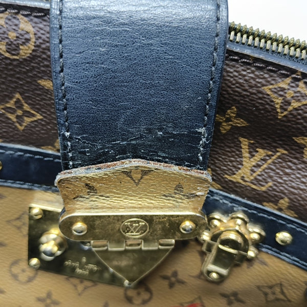 TRUNK Monogram Coated Canvas Brown