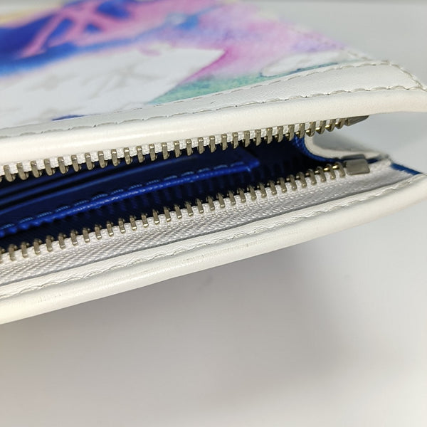 Pochette Voyag MM Monogram Coated Canvas White