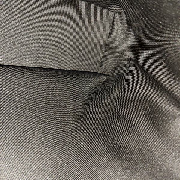 VOYAGER PM Monogram Coated Canvas Black