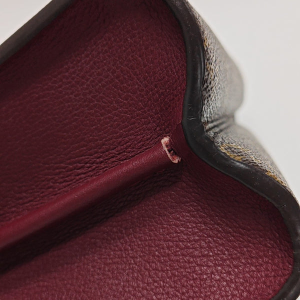 VICTOIRE Monogram Coated Canvas Brown