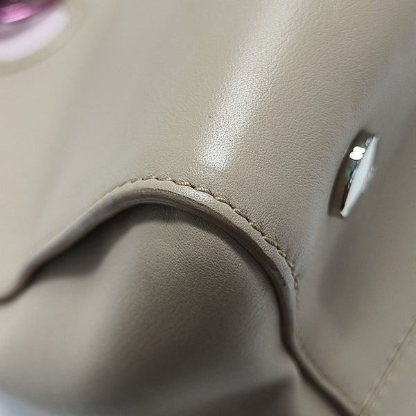 Christian Addict Calfskin Beige