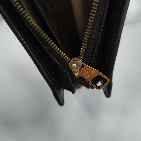 TRUNK Monogram Coated Canvas Brown