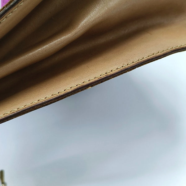 Authenticated pre-owned MACADAM BLASON TRIOMPHE Coated Canvas Brown - Top Handle Bag at Looply