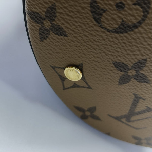 CANNES PM Monogram Coated Canvas Brown