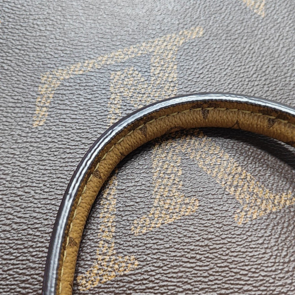 ONTHEGO MM Monogram Coated Canvas Brown