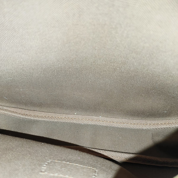 SAUMUR Monogram Coated Canvas Brown