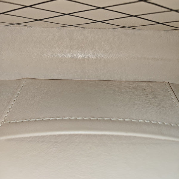 PETITE MALLE Monogram Coated Canvas Brown