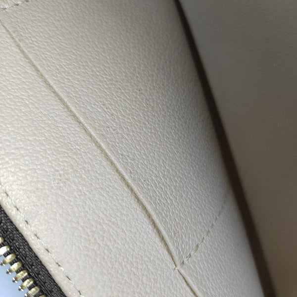 NICE Monogram Coated Canvas Brown