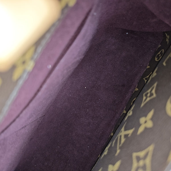 MONTAIGNE GM Monogram Coated Canvas Brown