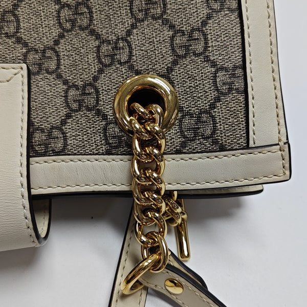 Padlock Small Monogram Coated Canvas Beige