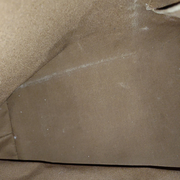 PIANO Monogram Coated Canvas Brown